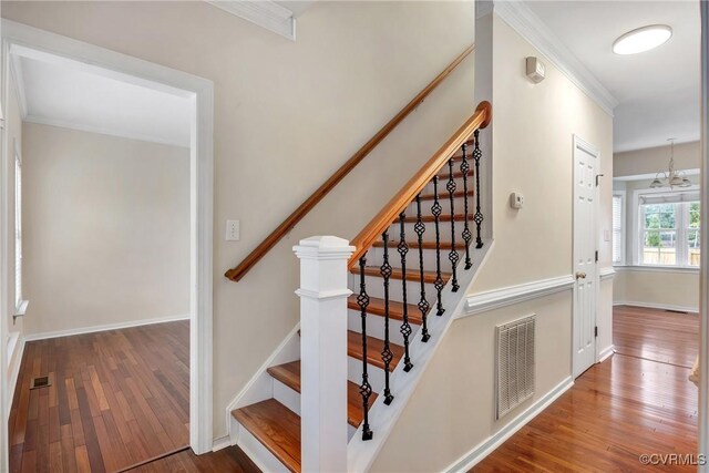 4221 Hunter Green Ct, Henrico, VA 23294 - stairway featuring wood finished floors, crown molding, and baseboards