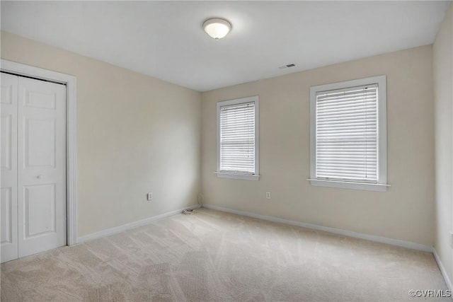 4221 Hunter Green Ct, Henrico, VA 23294 - unfurnished bedroom with carpet floors, baseboards, and a closet