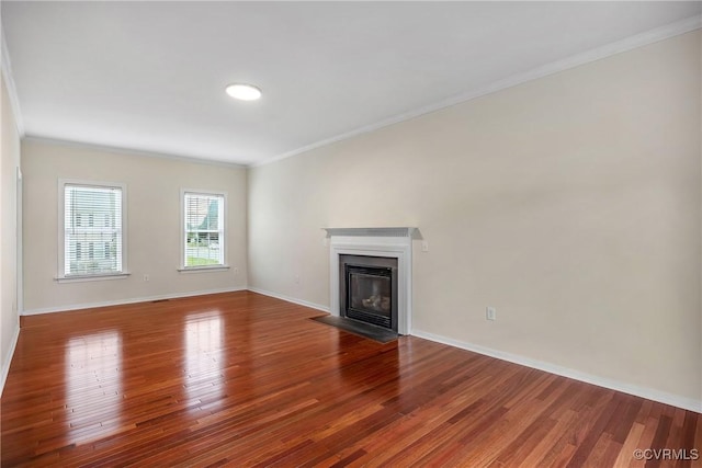 4221 Hunter Green Ct, Henrico, VA 23294 - unfurnished living room featuring ornamental molding, wood finished floors, baseboards, and a fireplace with flush hearth