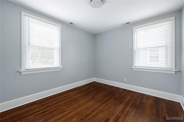 1811 Fenton St, Richmond, VA 23231 - unfurnished room featuring baseboards and dark wood finished floors