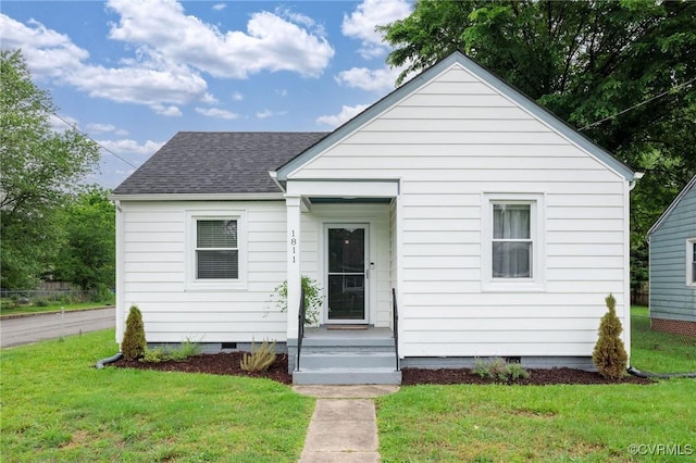 1811 Fenton St, Richmond, VA 23231 - bungalow with crawl space, a shingled roof, and a front yard
