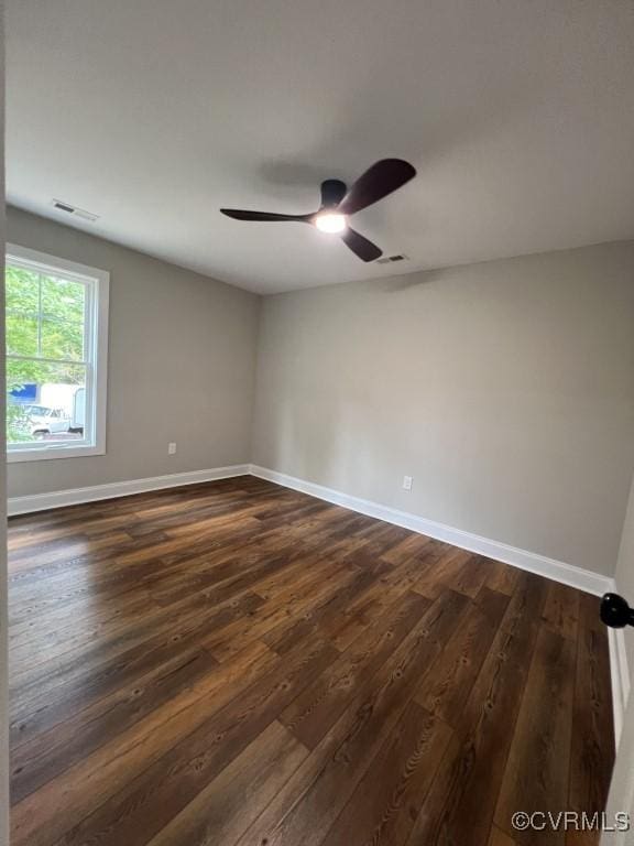 13335 Happy Hill Rd, Chesterfield, VA 23831 - empty room featuring dark wood finished floors, baseboards, and a ceiling fan