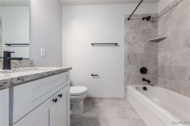 full bath with toilet, vanity, shower / tub combination, and baseboards