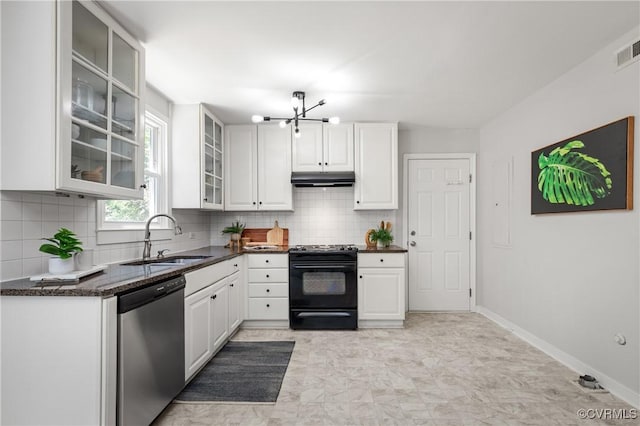 kitchen with stainless steel dishwasher, black range with electric stovetop, a sink, a chandelier, and backsplash