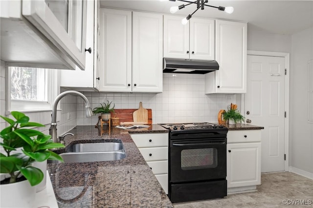 kitchen with black range oven, a sink, under cabinet range hood, and white cabinetry