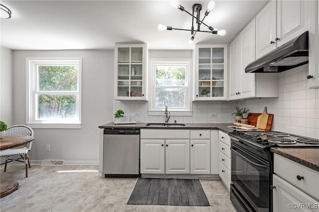 kitchen with dishwasher, black range with electric cooktop, under cabinet range hood, a sink, and white cabinetry