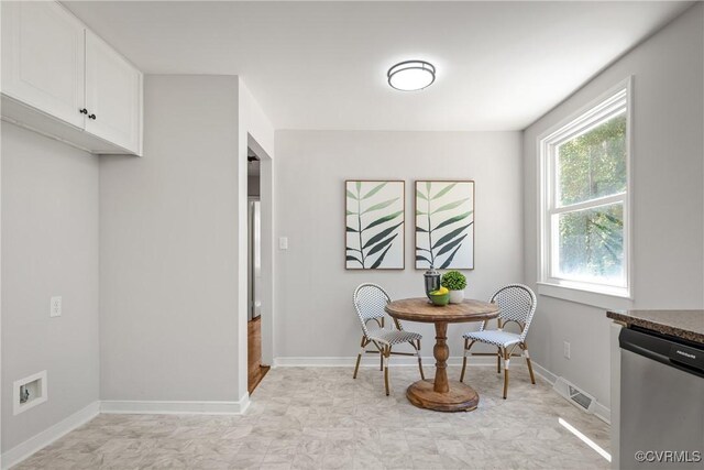 dining room featuring baseboards
