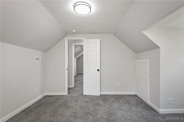 bonus room featuring carpet flooring, lofted ceiling, and baseboards