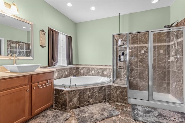 1601 Carty Bay Dr, Chester, VA 23836 - bathroom with a shower stall, vanity, a bath, and recessed lighting