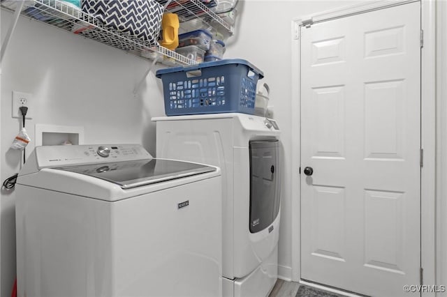 1601 Carty Bay Dr, Chester, VA 23836 - laundry room featuring washer and clothes dryer and wood finished floors