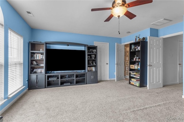 1601 Carty Bay Dr, Chester, VA 23836 - carpeted living area featuring ceiling fan and baseboards
