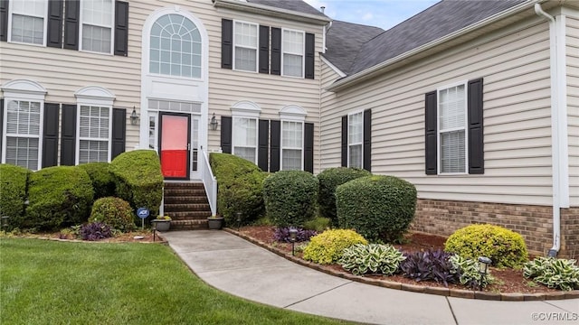 1601 Carty Bay Dr, Chester, VA 23836 - entrance to property with a shingled roof and a lawn