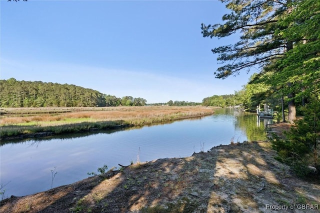 591 Plantation Rd, North, VA 23128 - water view featuring a heavily wooded area