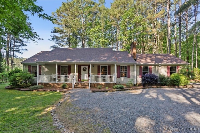 591 Plantation Rd, North, VA 23128 - ranch-style home with a porch, a front yard, and a chimney