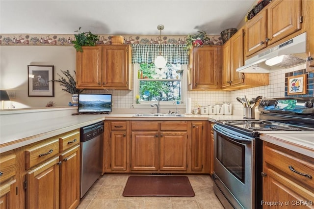 591 Plantation Rd, North, VA 23128 - kitchen with appliances with stainless steel finishes, under cabinet range hood, a sink, and light countertops