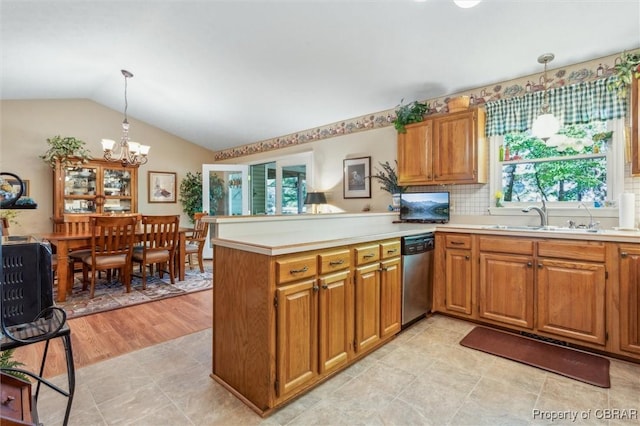 591 Plantation Rd, North, VA 23128 - kitchen with dishwasher, a sink, a peninsula, healthy amount of natural light, and vaulted ceiling