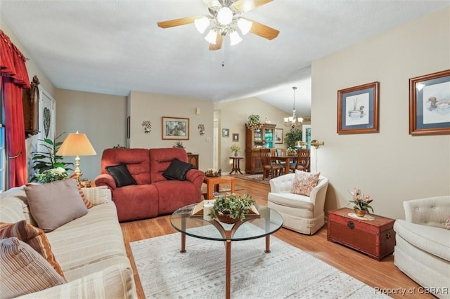 591 Plantation Rd, North, VA 23128 - living area with light wood-type flooring, a ceiling fan, a chandelier, and vaulted ceiling