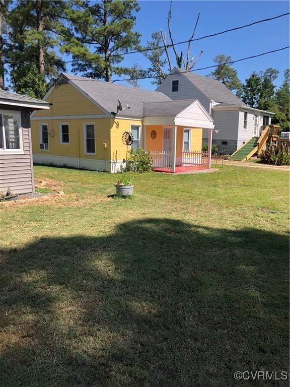 41 Hobday St, Mathews, VA 23128 - rear view of property with a lawn