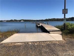 41 Hobday St, Mathews, VA 23128 - dock featuring a boat ramp and a water view