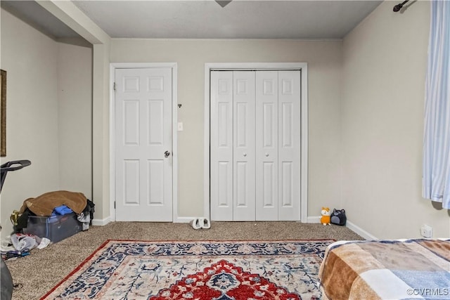10717 Greenwood Rd, Henrico, VA 23059 - bedroom with carpet flooring, a closet, and baseboards