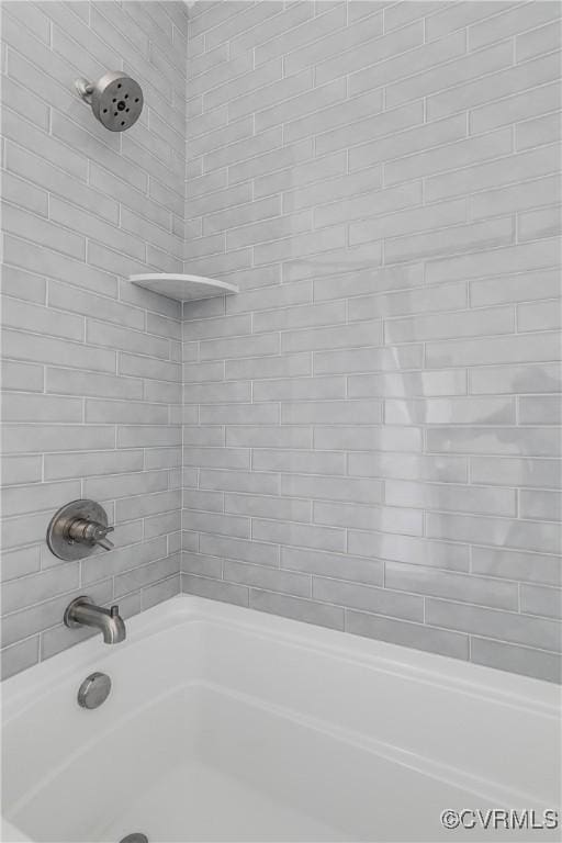 full bath featuring bathing tub / shower combination