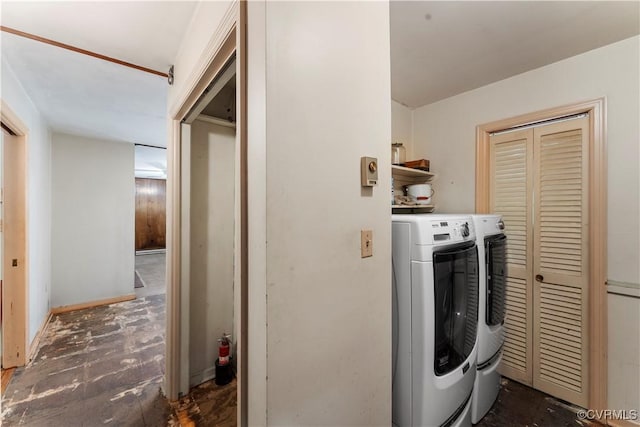 washroom featuring washer and clothes dryer