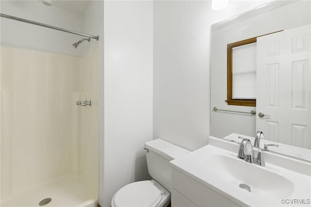9606 Ladue Rd, North Chesterfield, VA 23237 - bathroom with a shower stall, toilet, and vanity