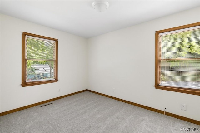 9606 Ladue Rd, North Chesterfield, VA 23237 - empty room featuring baseboards and light carpet