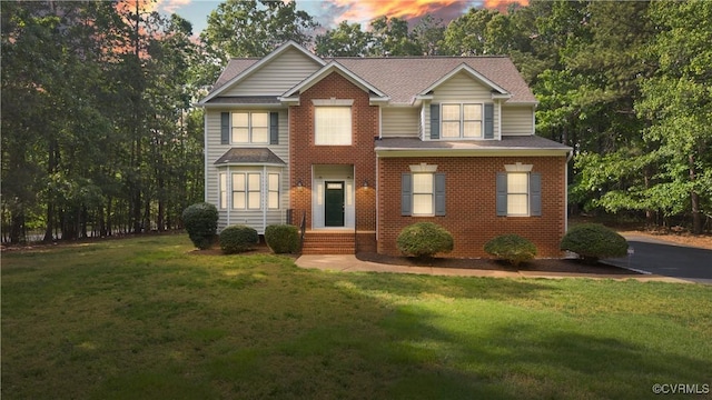 11324 Regalia Dr, Chesterfield, VA 23838 - view of front of house with a front yard, roof with shingles, and brick siding