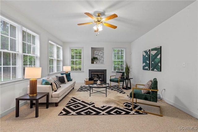 11324 Regalia Dr, Chesterfield, VA 23838 - living area featuring baseboards, a ceiling fan, a glass covered fireplace, and carpet