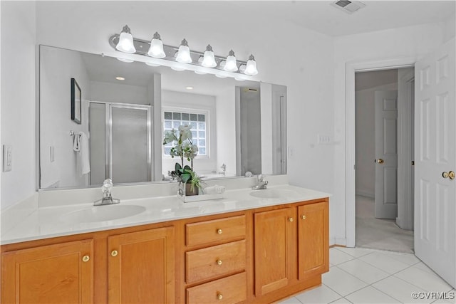11324 Regalia Dr, Chesterfield, VA 23838 - full bathroom with a shower stall, double vanity, and tile patterned floors