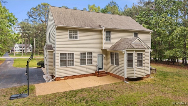 11324 Regalia Dr, Chesterfield, VA 23838 - back of property with entry steps, a yard, a patio, crawl space, and a shingled roof