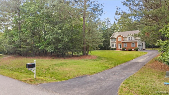 11324 Regalia Dr, Chesterfield, VA 23838 - view of front facade with asphalt driveway and a front lawn