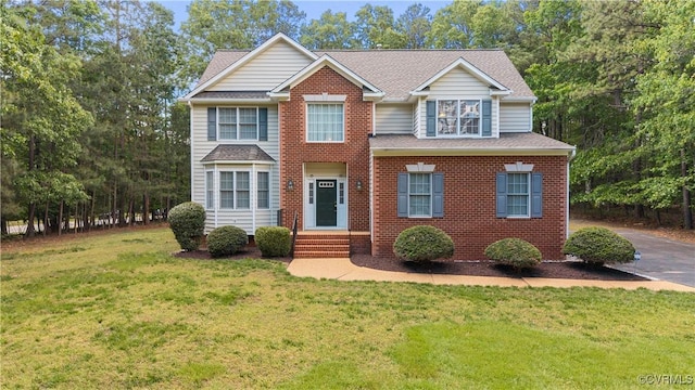 11324 Regalia Dr, Chesterfield, VA 23838 - view of front of property with a front yard, roof with shingles, entry steps, and brick siding