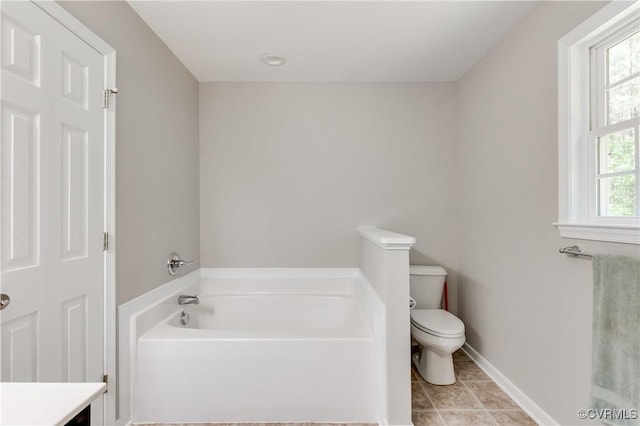 6320 Walnut Tree Dr, Powhatan, VA 23139 - full bath featuring a garden tub, toilet, plenty of natural light, and tile patterned flooring