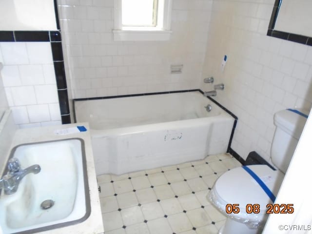 3740 Turner Rd, Richmond, VA 23832 - full bath with tile walls, toilet, and a sink