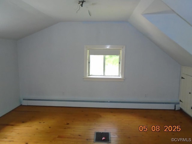 3740 Turner Rd, Richmond, VA 23832 - bonus room featuring lofted ceiling, a baseboard heating unit, and wood finished floors