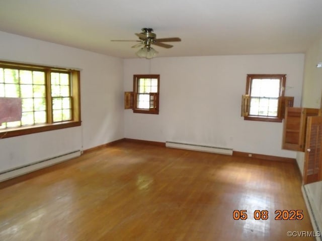 3740 Turner Rd, Richmond, VA 23832 - unfurnished room featuring a baseboard heating unit, a ceiling fan, wood finished floors, baseboard heating, and baseboards