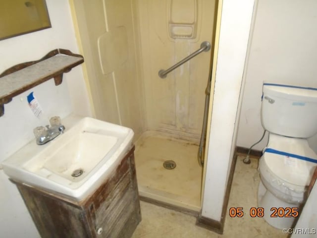 3740 Turner Rd, Richmond, VA 23832 - full bathroom featuring a shower stall, toilet, vanity, and baseboards