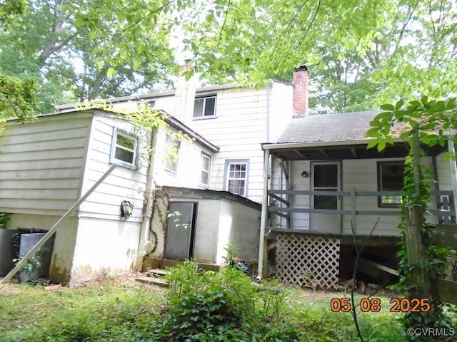 3740 Turner Rd, Richmond, VA 23832 - rear view of house with a chimney and a shed