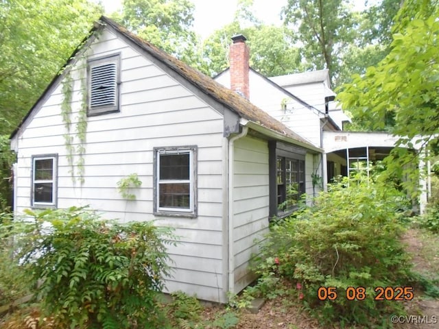 3740 Turner Rd, Richmond, VA 23832 - view of side of property with a chimney