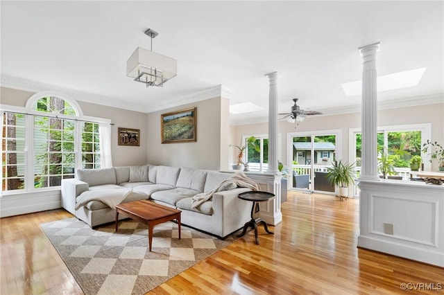 11458 Barrington Bridge Ct, Henrico, VA 23233 - living room featuring light wood-style flooring, crown molding, ornate columns, and plenty of natural light