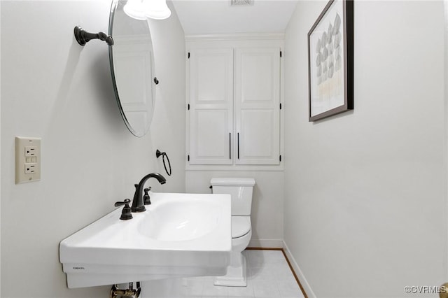11458 Barrington Bridge Ct, Henrico, VA 23233 - bathroom with a sink, toilet, baseboards, and tile patterned flooring