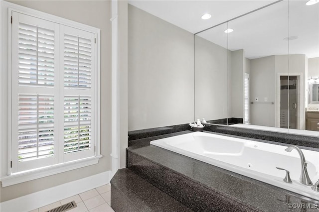 11458 Barrington Bridge Ct, Henrico, VA 23233 - bathroom featuring a jetted tub, tile patterned flooring, healthy amount of natural light, and recessed lighting