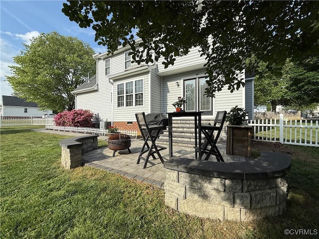view of patio / terrace with an outdoor fire pit