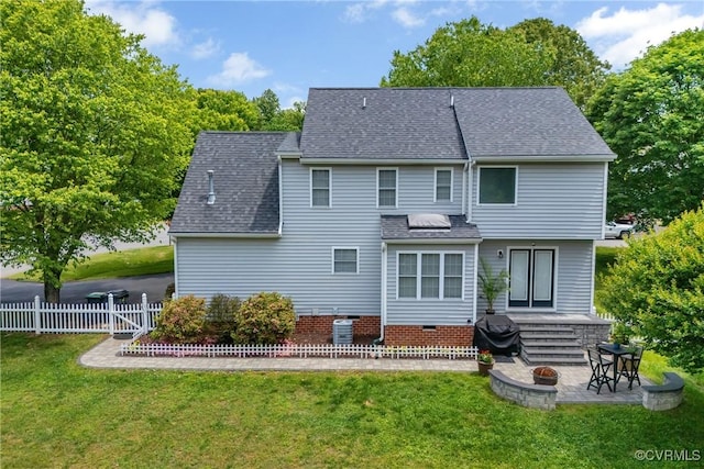 back of house featuring a patio, roof with shingles, and central AC unit