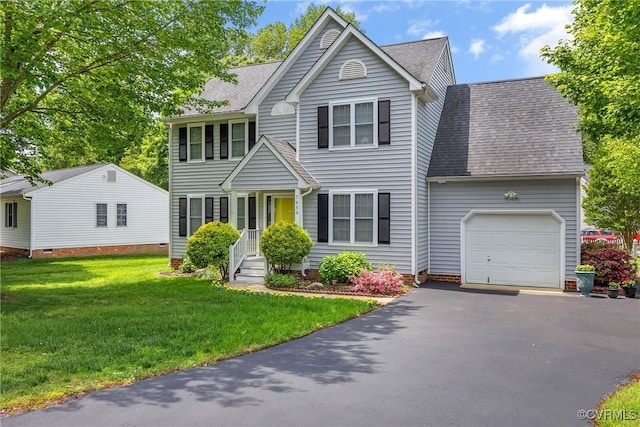 view of front facade with a garage, roof with shingles, asphalt driveway, and a front lawn