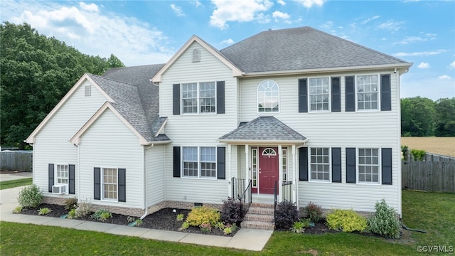 view of front of property with a shingled roof