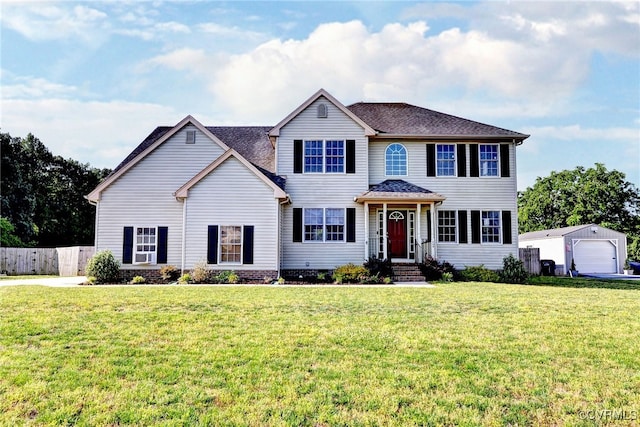 view of front facade featuring an outdoor structure and a garage