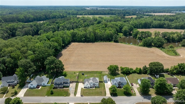 view of rural area featuring a forest